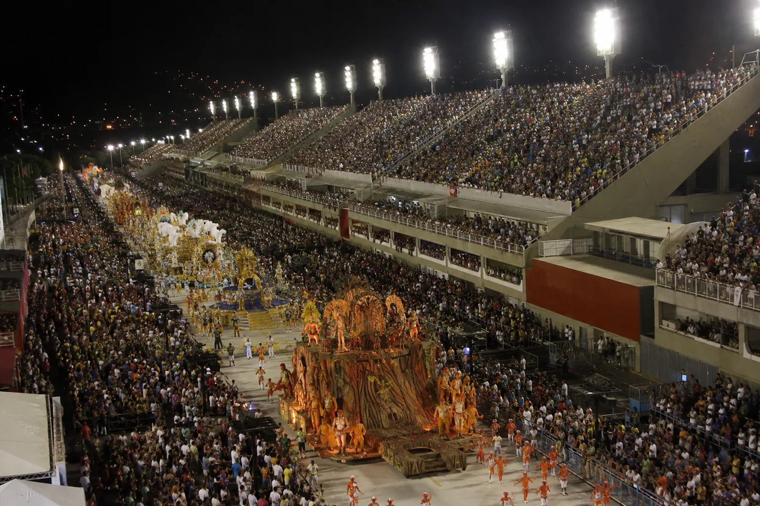The Sambadrome avenue lit up on parade night, seen from the stands