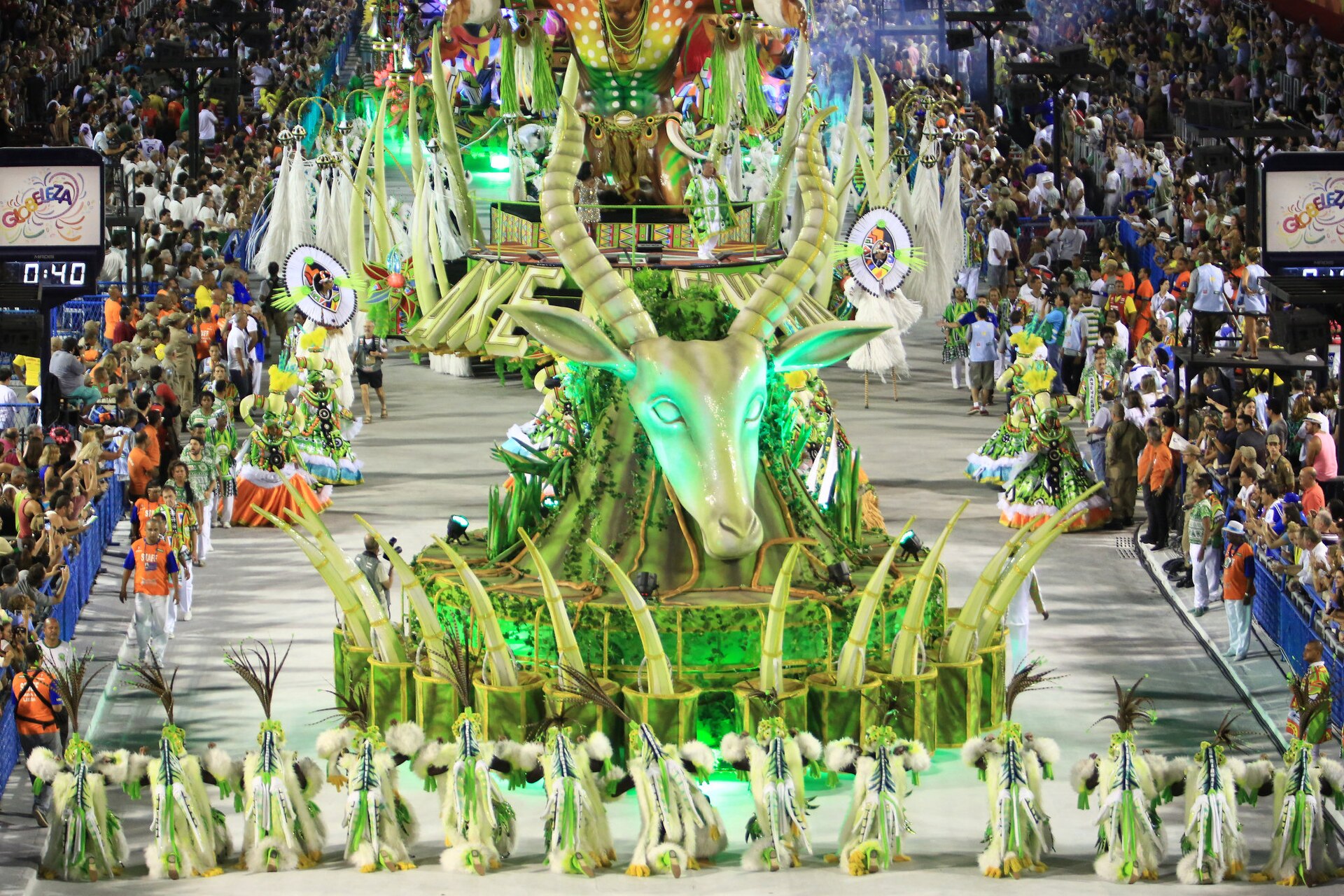 A samba school parading through the Sambadrome at night, Rio de Janeiro